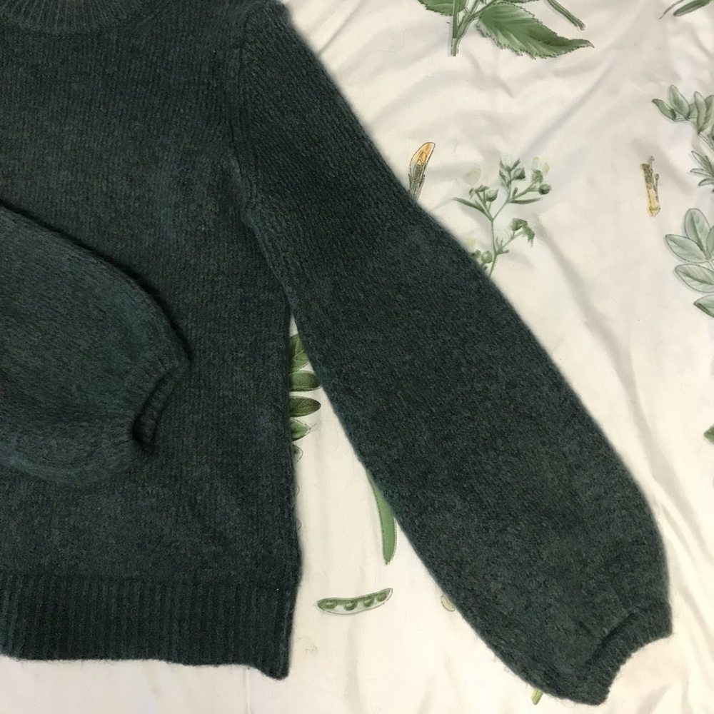 Knit wool-blend sweater.